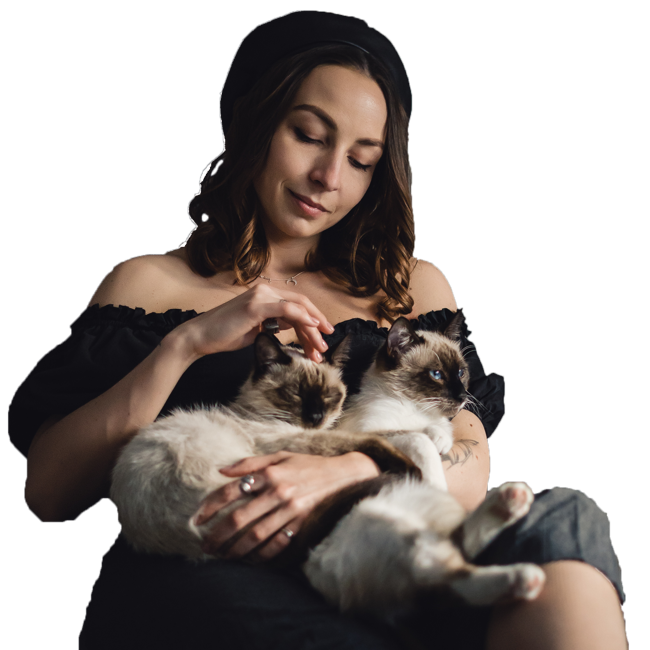 Woman Holding Emotional Support Cats